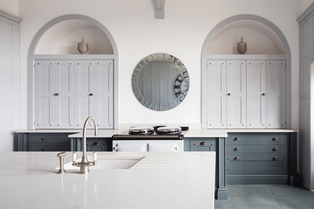 luxury bespoke kitchen with handcrafted counters and cupboards