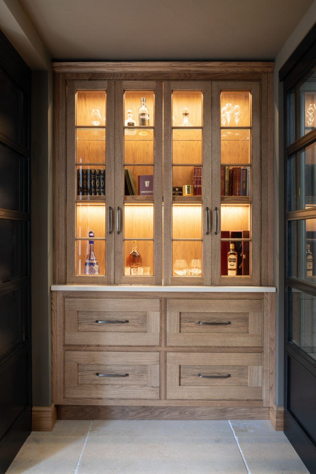 A wooden feature cabinet with LED back-lighting for kitchen, walkways and living rooms